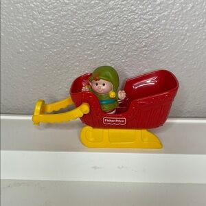 Late 1990’s Fisher-Price Red and Yellow Sleigh with Santa elf